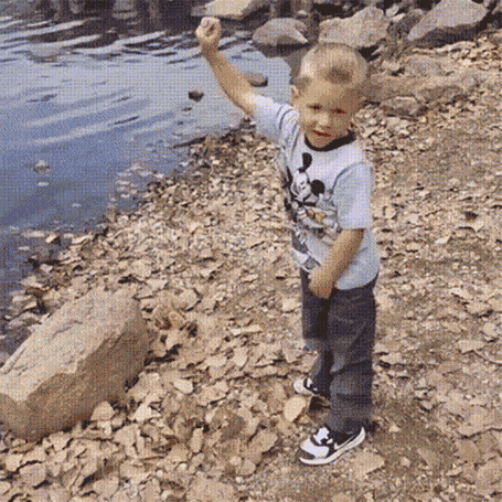funn-kid-throws-rock-lake-breaks-camera.gif