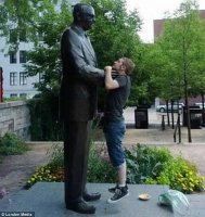 statue-choking-58b8cf163df78c353c21d4e5.jpg