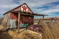 abandoned-old-pickup-truck-front-deserted-texaco-station-remote-part-nebraska-91998108.jpg