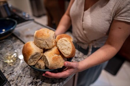 woman-holding-bowl-freshly-cooked-rolls-preparation-home-dinner-woman-holding-bowl-freshly-coo...jpg