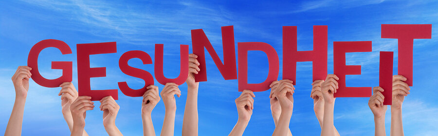 bigstock-People-Holding-German-Word-Ges-85410443.jpg
