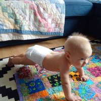 Blythe at 6 mos doing push ups.jpg