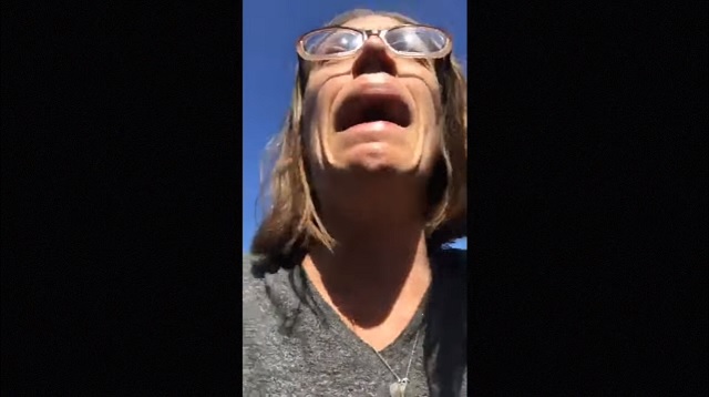 woman-cries-over-flag2.jpg